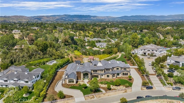 drone / aerial view featuring a mountain view