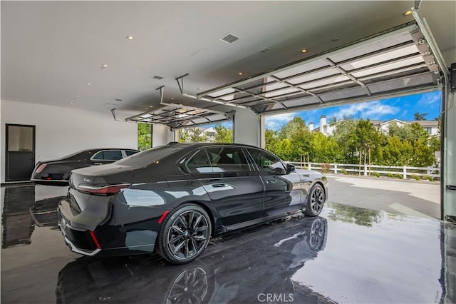 garage featuring a carport