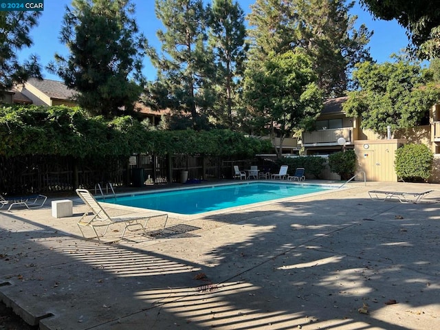 view of pool with a patio