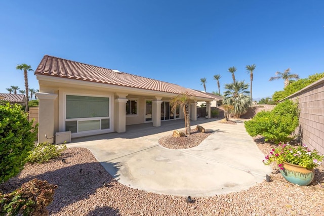 back of house featuring a patio