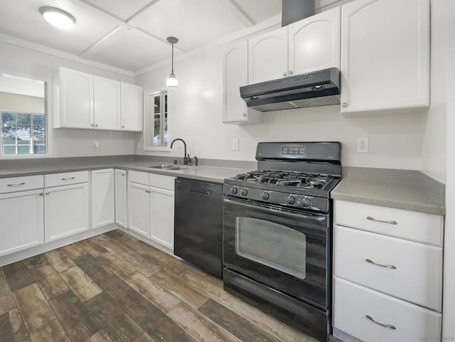 kitchen with sink, white cabinets, and black appliances