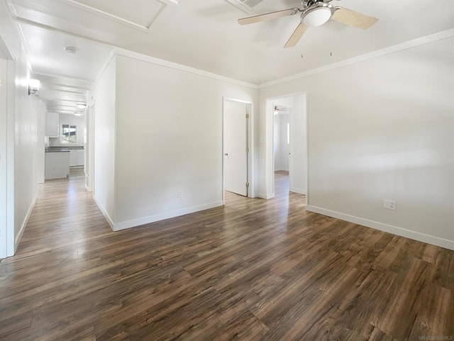 unfurnished room featuring crown molding, ceiling fan, and dark wood-type flooring