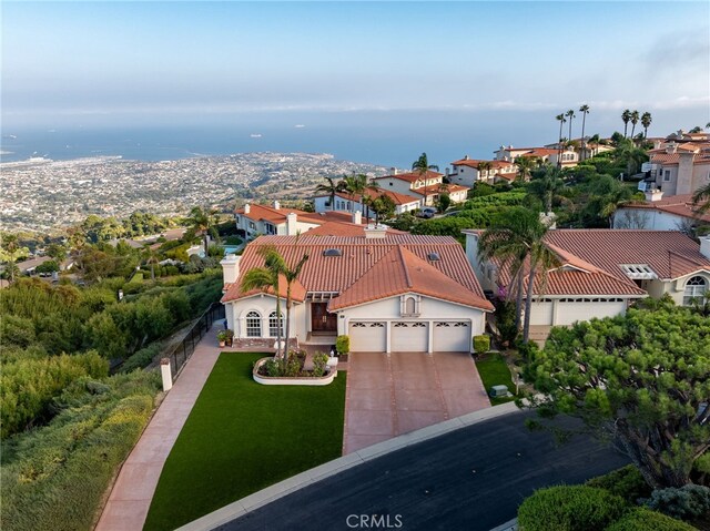 birds eye view of property with a residential view