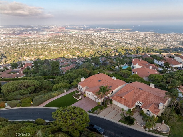 birds eye view of property with a residential view