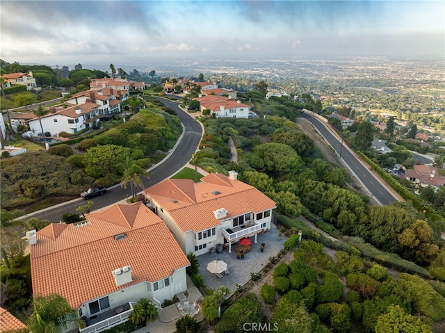 birds eye view of property with a residential view