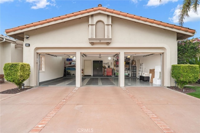 garage with driveway