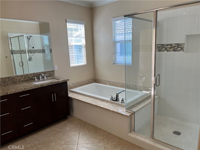 bathroom featuring vanity, plus walk in shower, tile patterned flooring, and ornamental molding