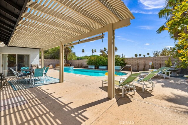 view of swimming pool with a pergola and a patio area