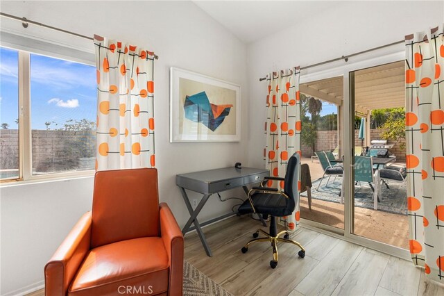 home office featuring hardwood / wood-style floors