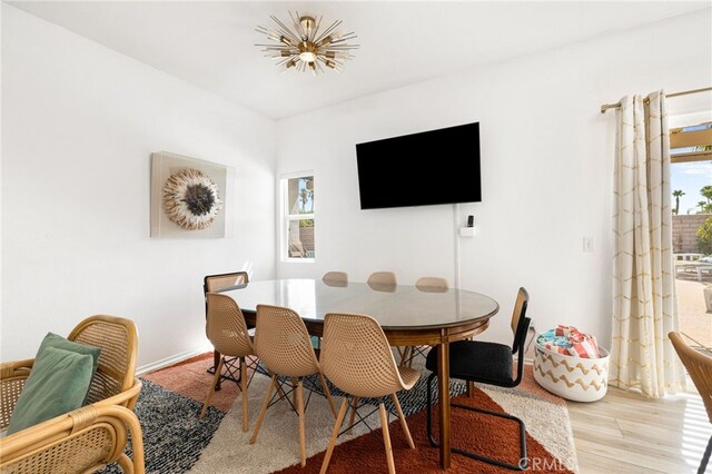 dining space featuring light hardwood / wood-style flooring