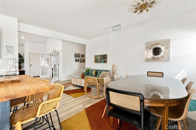 dining area featuring wood-type flooring