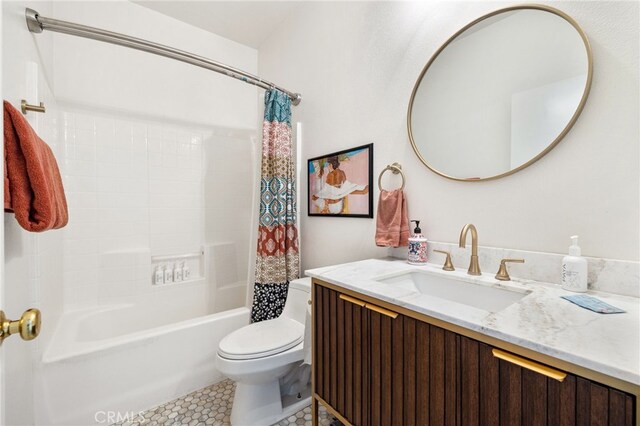 full bathroom with shower / bath combination with curtain, vanity, toilet, and tile patterned floors