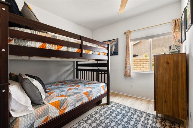 bedroom featuring ceiling fan and light wood-type flooring