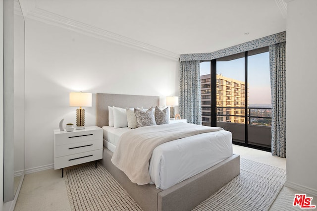 carpeted bedroom with ornamental molding, access to exterior, and floor to ceiling windows