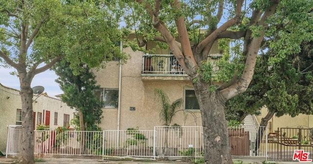 exterior space with a balcony