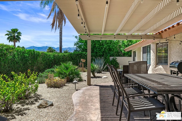 view of patio featuring a mountain view