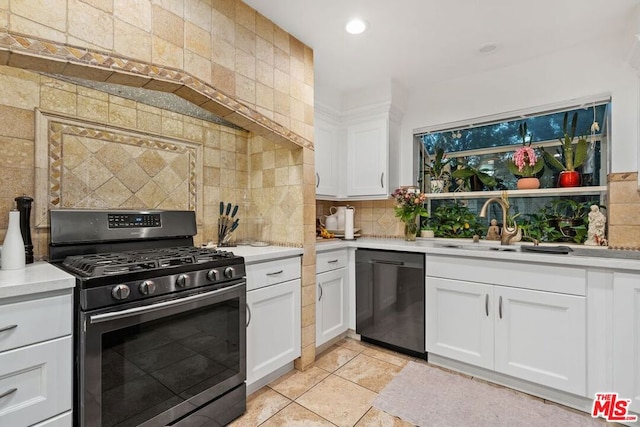 kitchen with sink, white cabinetry, black dishwasher, gas stove, and decorative backsplash