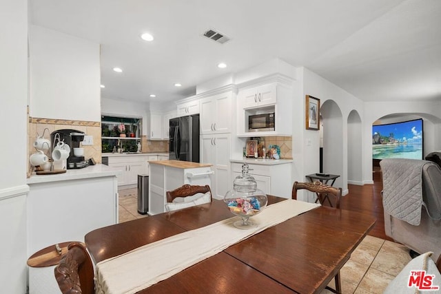 dining room with light wood-type flooring