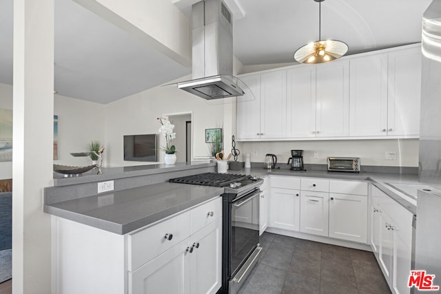 kitchen with gas stove, white cabinetry, extractor fan, and lofted ceiling