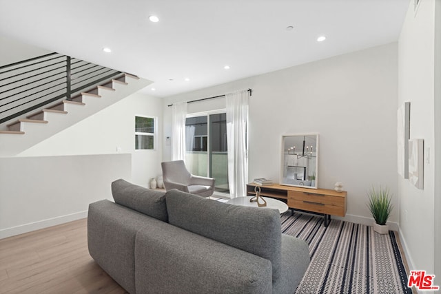 living room with light hardwood / wood-style floors