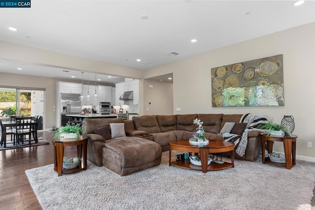 living room featuring dark hardwood / wood-style flooring