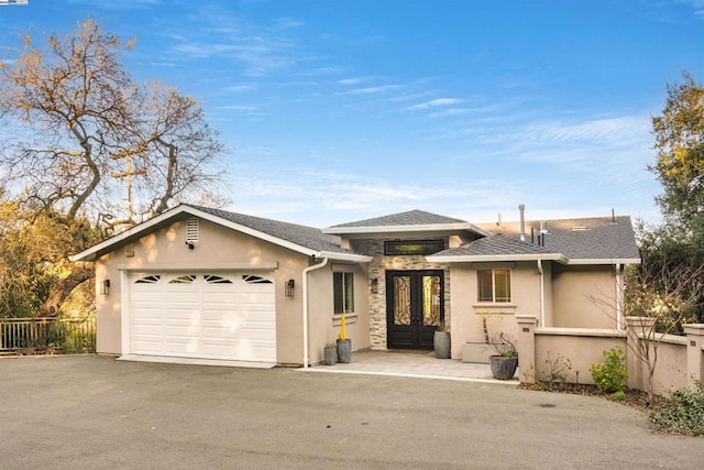 view of front of house with a garage