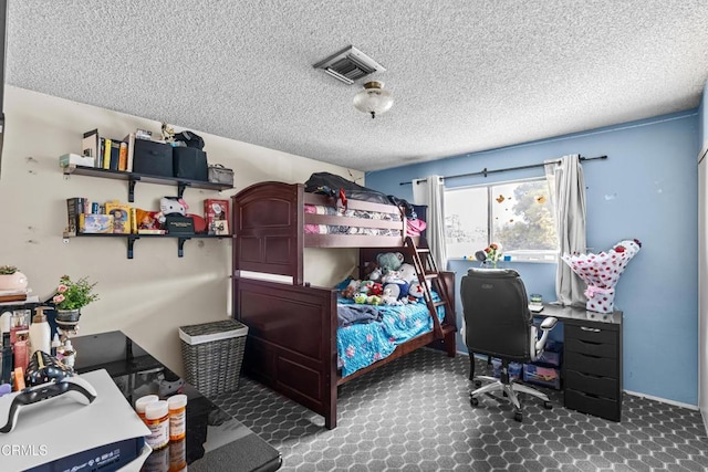 bedroom with a textured ceiling