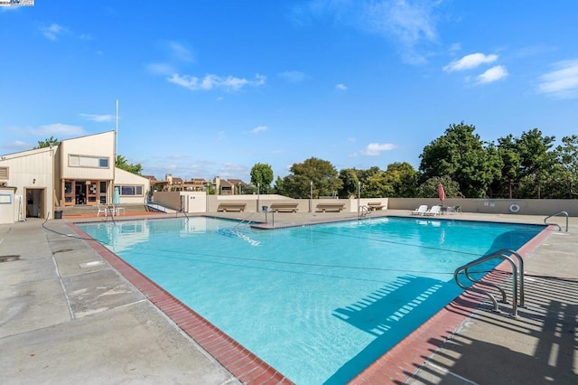 view of pool with a patio