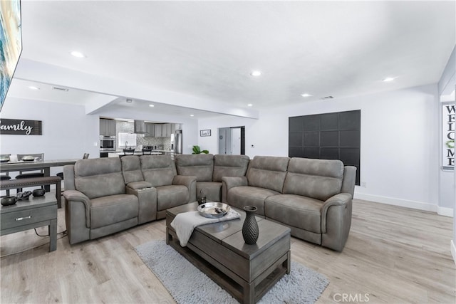 living room featuring light hardwood / wood-style floors