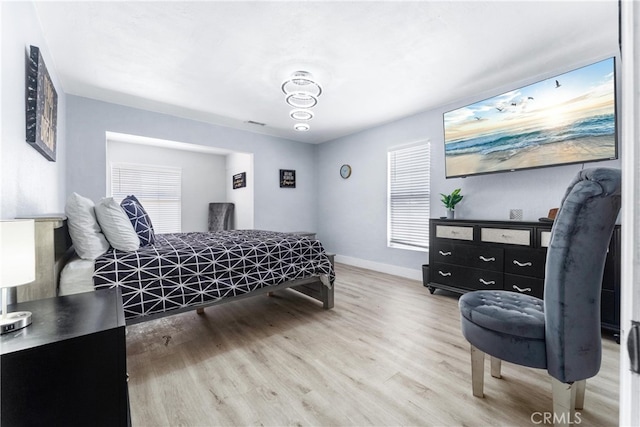 bedroom featuring hardwood / wood-style floors