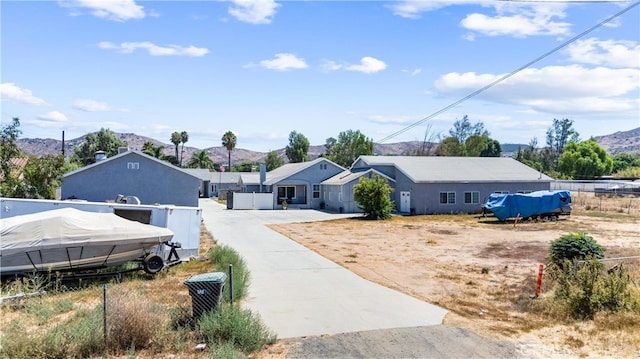 view of front of home with a mountain view