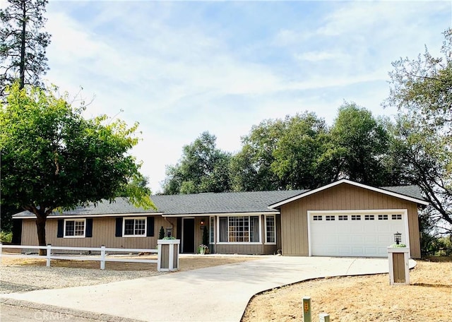 ranch-style house featuring a garage