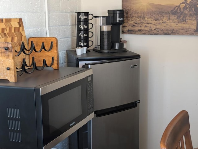 interior details featuring appliances with stainless steel finishes