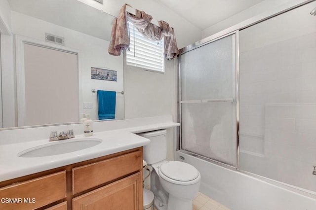 full bathroom with vanity, toilet, and combined bath / shower with glass door