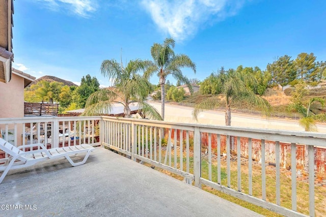 balcony featuring a mountain view