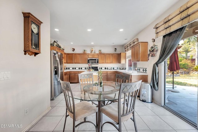 dining room featuring light tile patterned floors