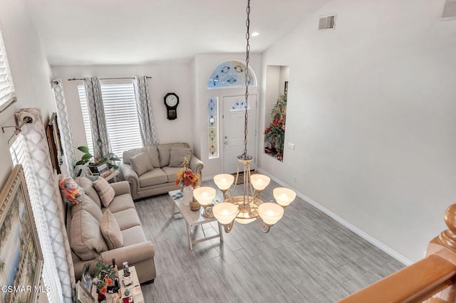 living room with light hardwood / wood-style floors and a fireplace