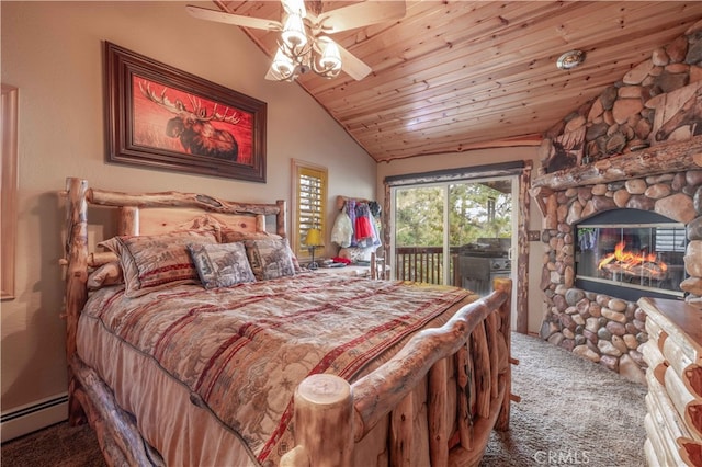 carpeted bedroom featuring lofted ceiling, ceiling fan, access to exterior, a stone fireplace, and baseboard heating