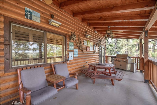 view of patio with covered porch and a grill