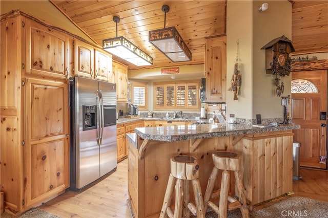 kitchen with wood ceiling, light hardwood / wood-style floors, stainless steel fridge with ice dispenser, and kitchen peninsula