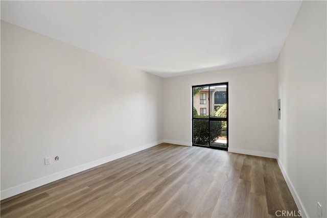 empty room featuring light hardwood / wood-style floors