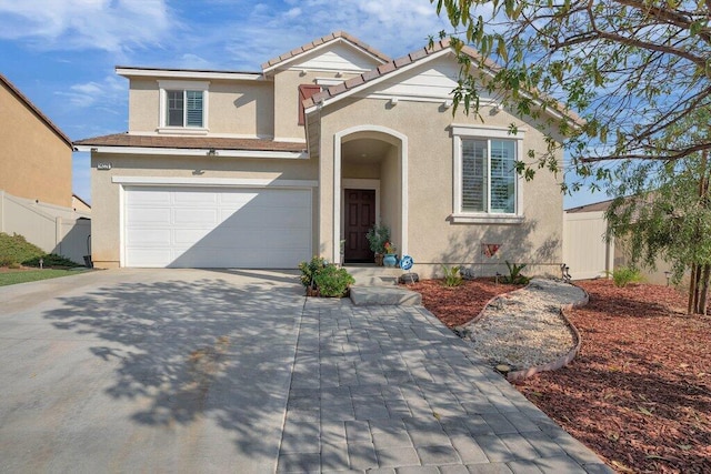 front of property with a garage