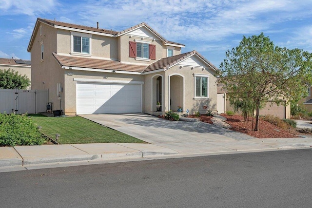 view of front of property with a garage