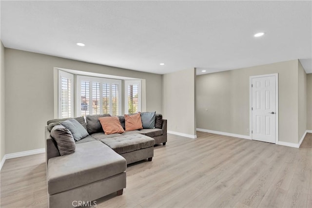 living room with light hardwood / wood-style floors