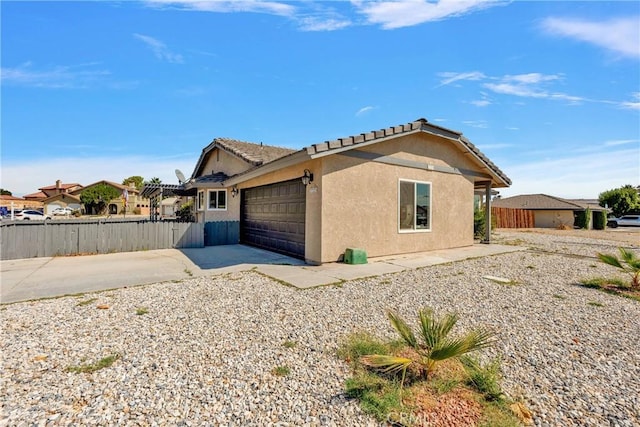 view of home's exterior featuring a garage