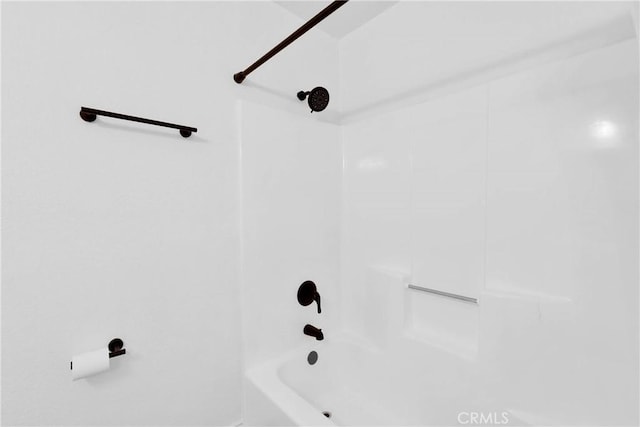 interior details with shower / bathing tub combination