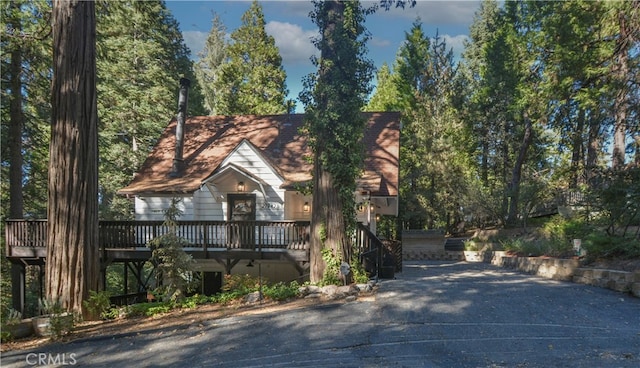 view of front of house with a wooden deck