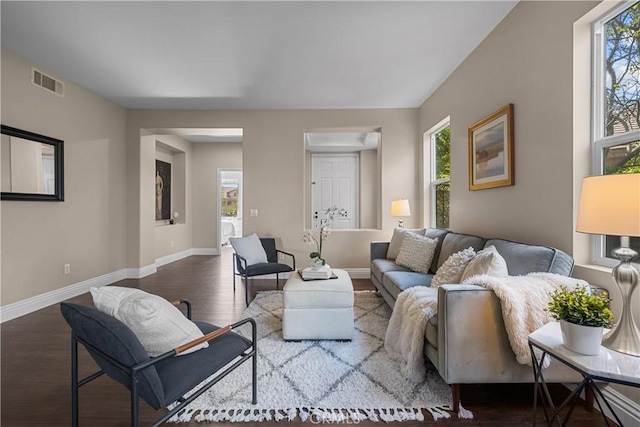 living room featuring dark hardwood / wood-style flooring