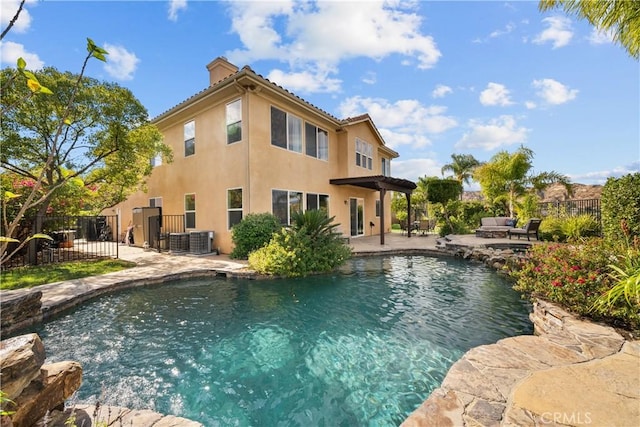 view of pool featuring a patio and central air condition unit