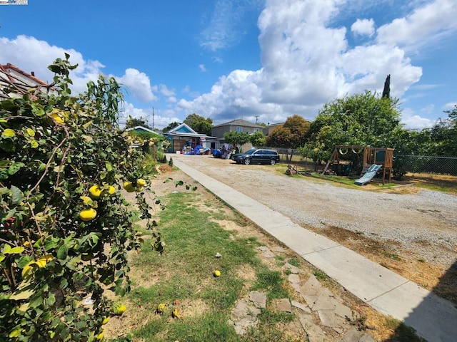 view of yard with a playground